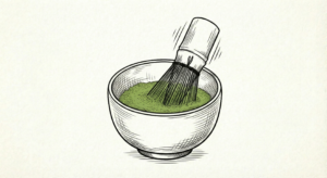 Bewege den Bambusbesen im Matcha zügig in einer M oder W Bewegung